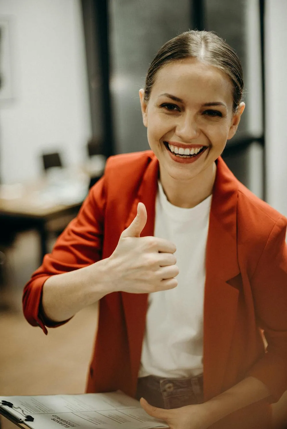 business woman happy thumbs up